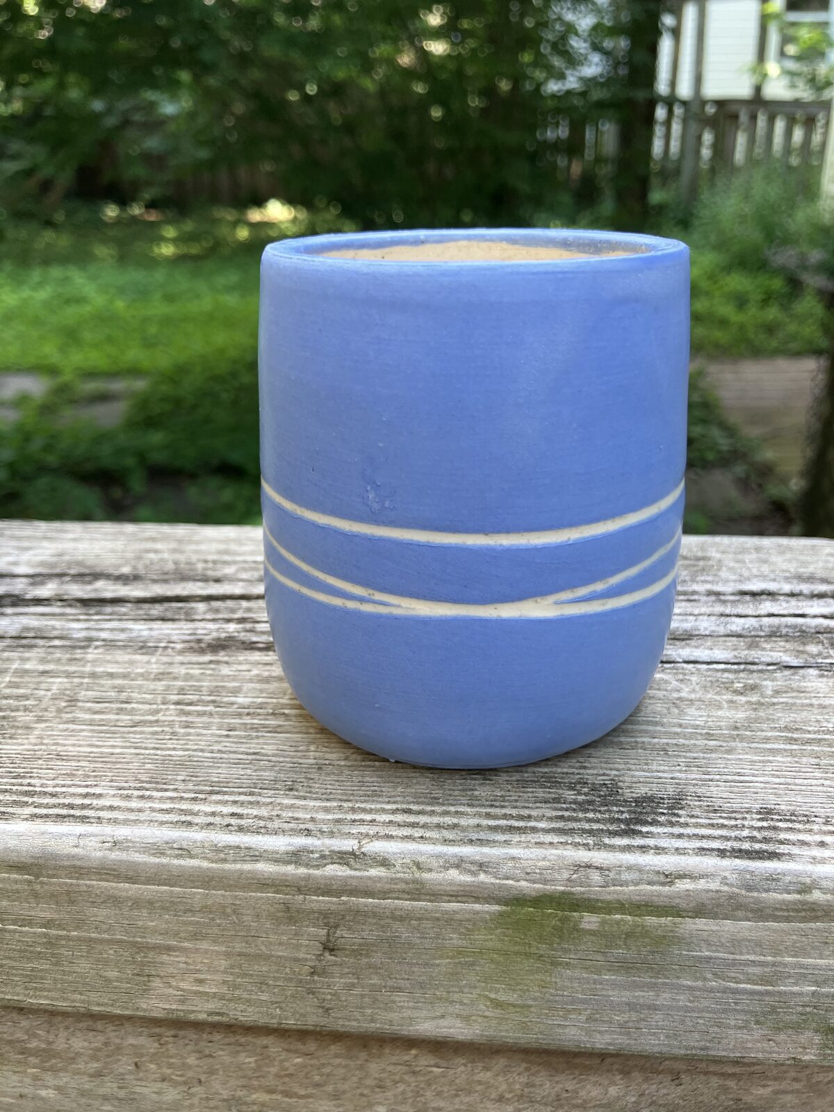 Cornflower blue ceramic tumbler with ribbed bands