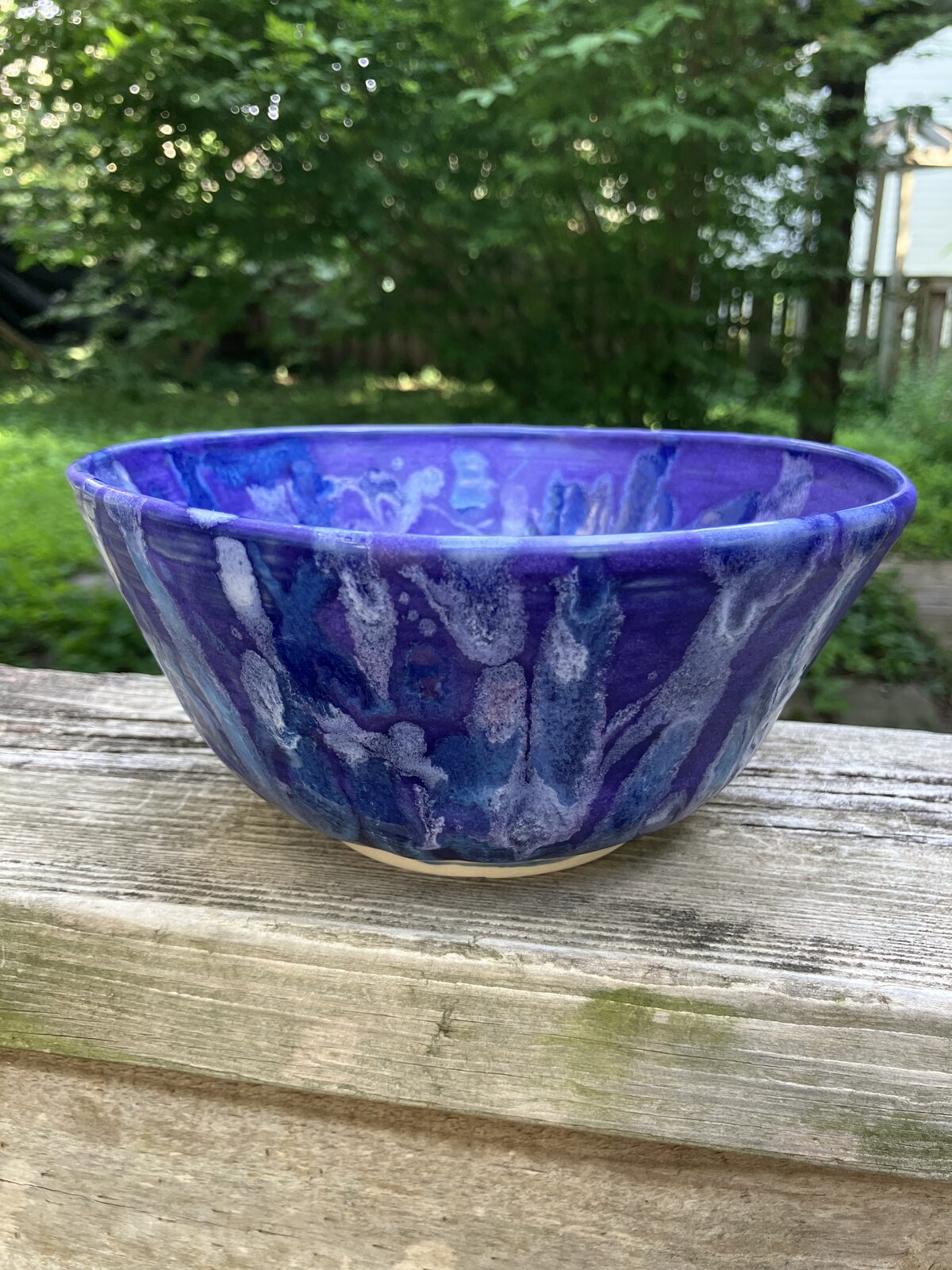 Ceramic bowl with cobalt blue splash glaze