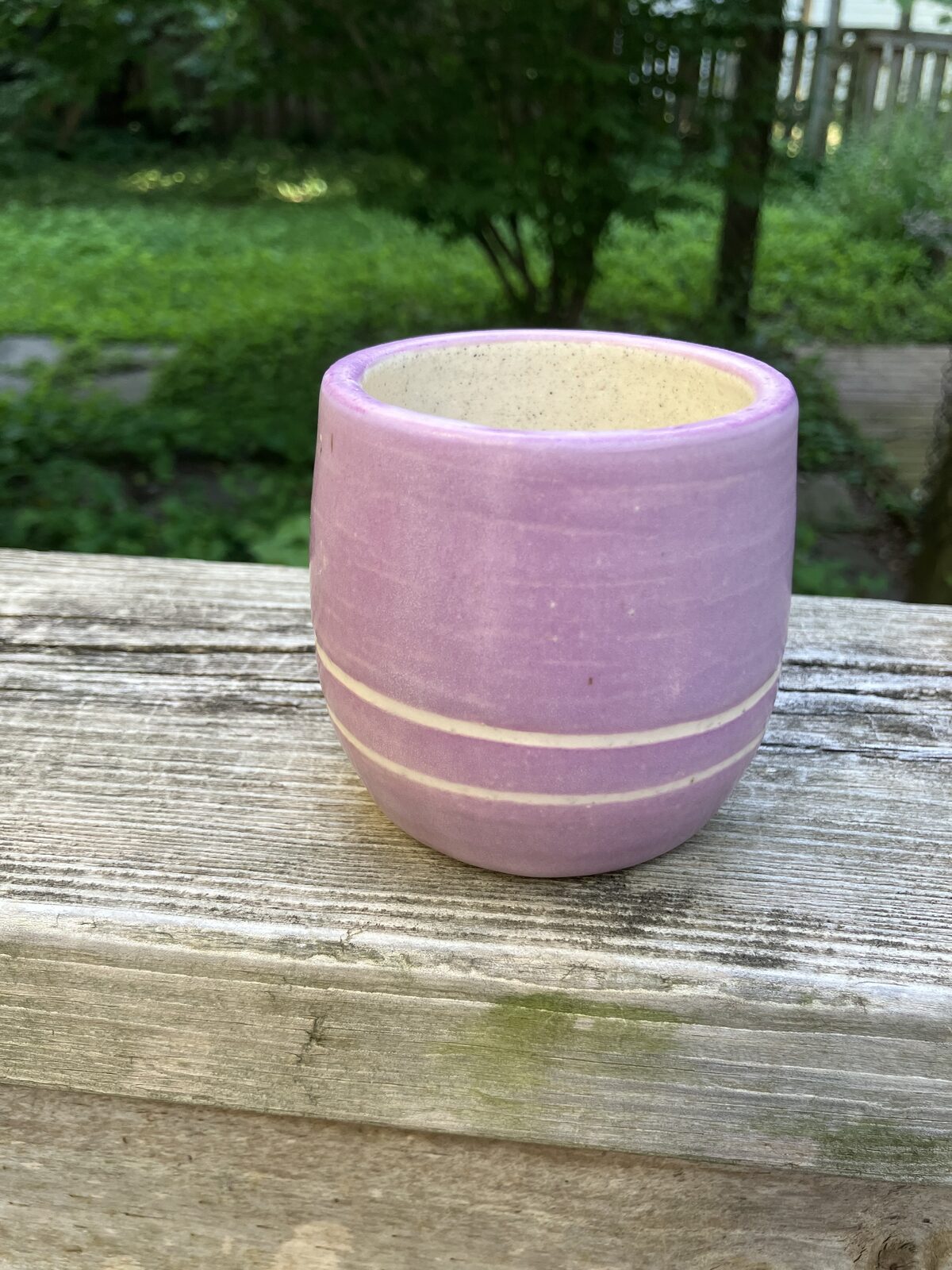 Pink and lavender glazed ceramic tumbler