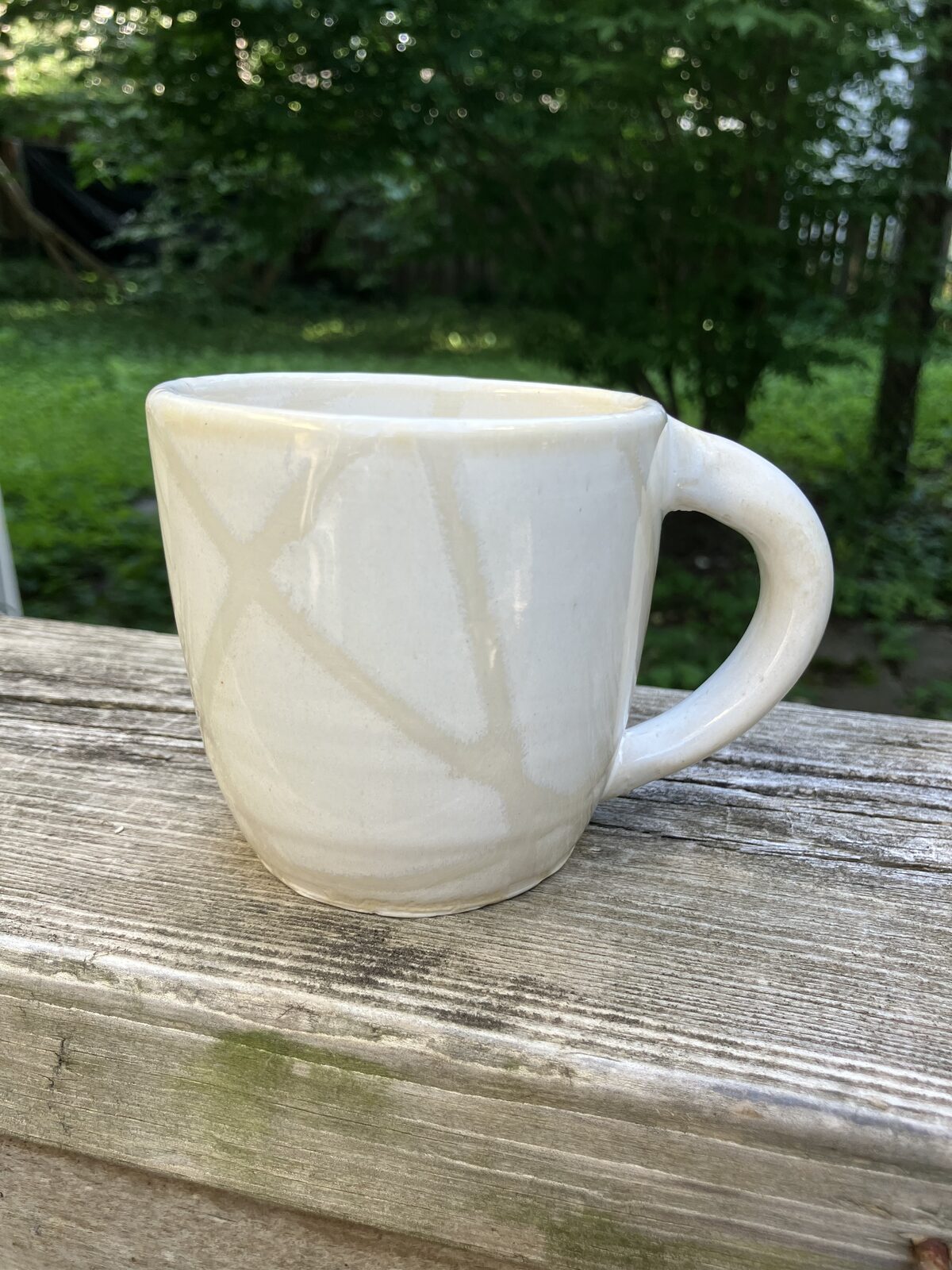 White ceramic mug with handle