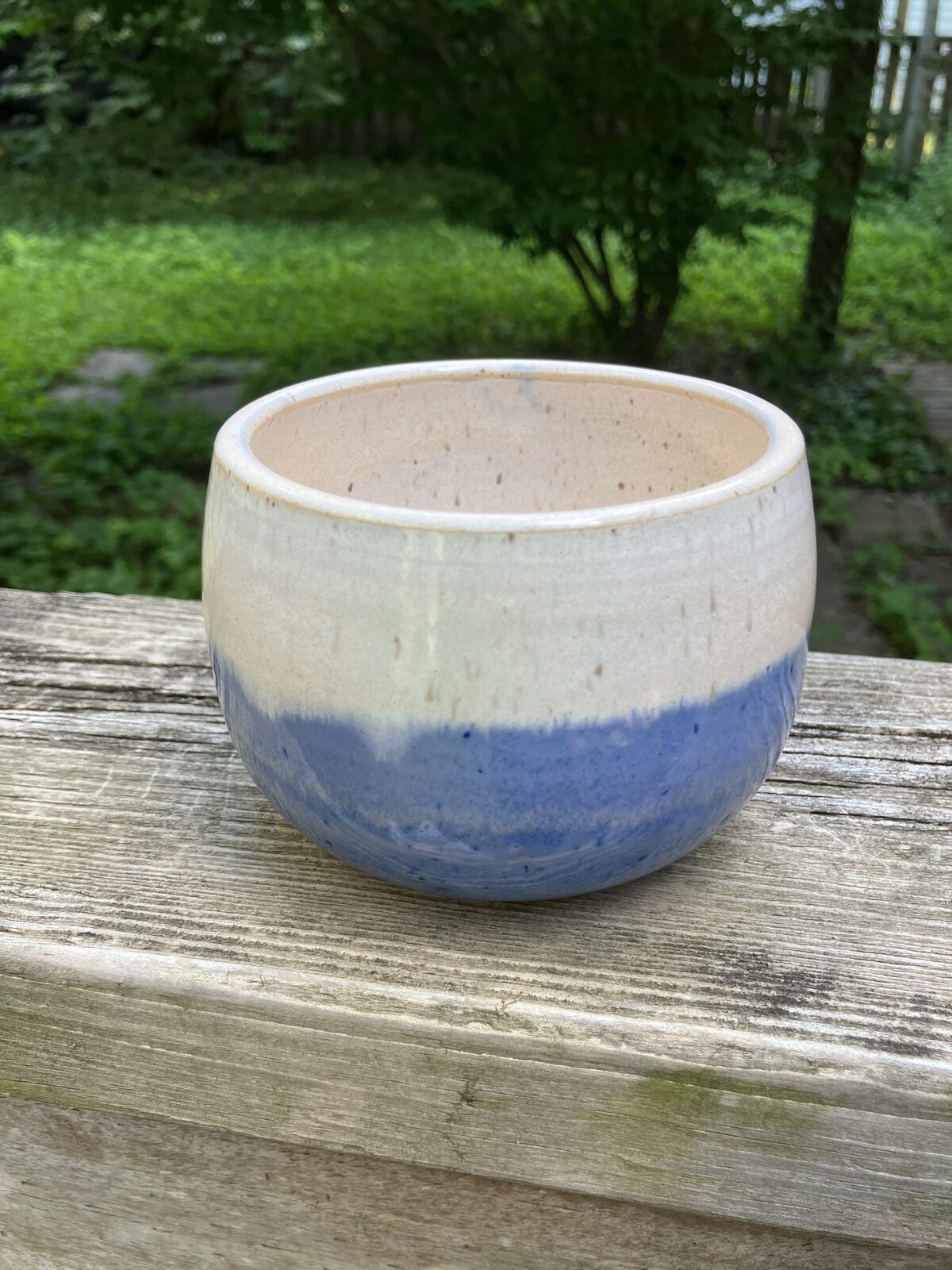 White ceramic bowl with cobalt blue base