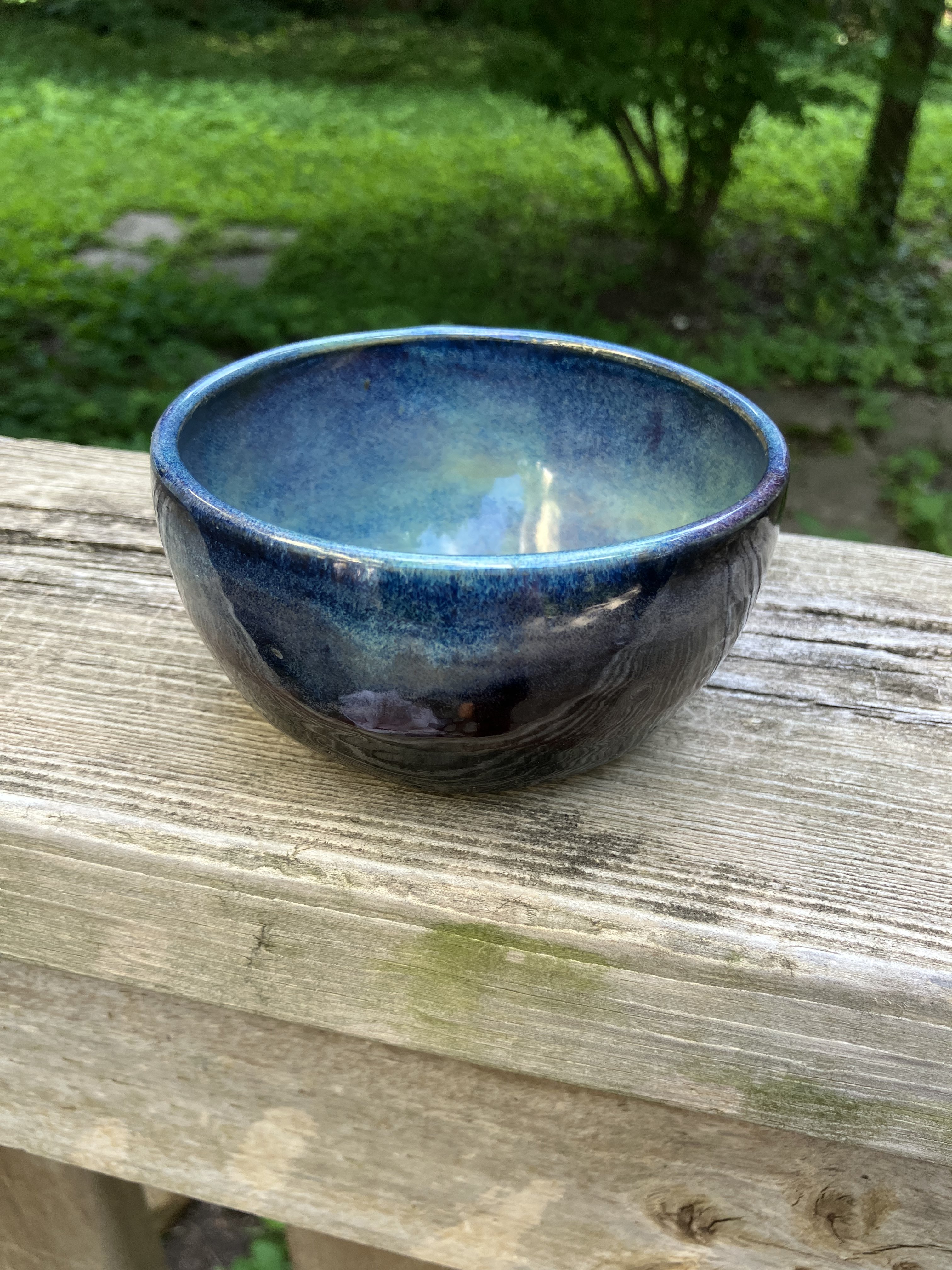 Ceramic bowl with deep blue and indigo glaze