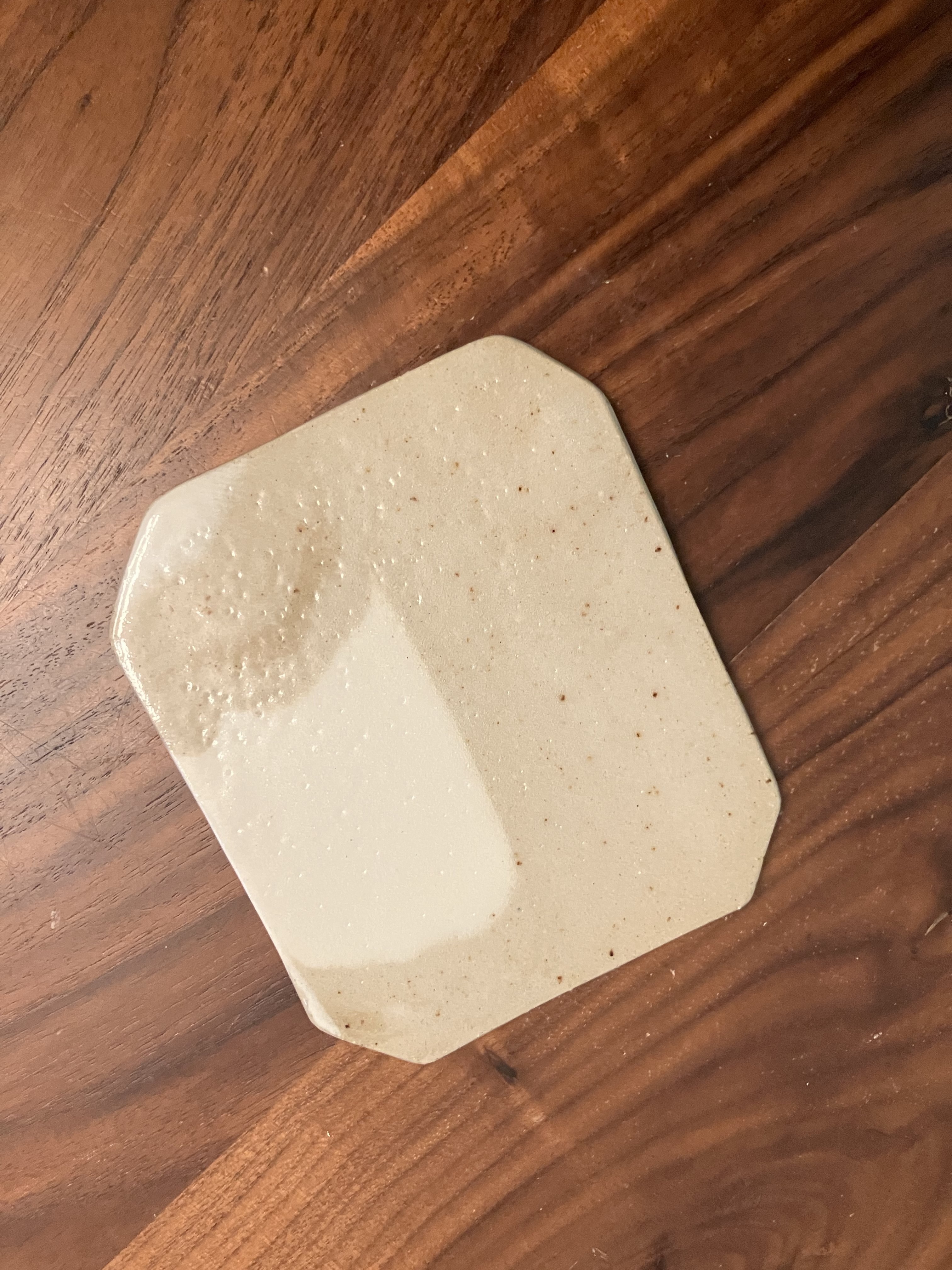 Cream and tan coaster